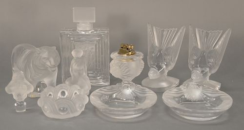 Group of ten pieces of Lalique, 
frosted glass standing tiger, bottle with nude figures "Duncan" and stopper, pair of frosted glass ...