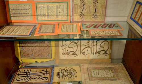 Group of fourteen assorted Persian Arabic illuminated script leaves, gilt gold painted calligraphic panels, possibly in Nasta'liq, f...