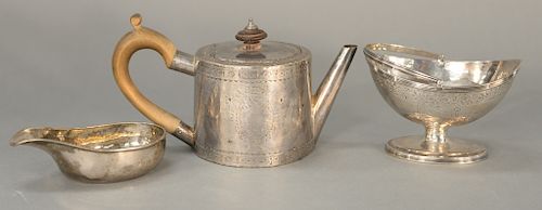 Three piece lot to include a Georgian silver teapot with straight spout, 18th century and a pourer and sugar bowl (worn). 
teapot: h...