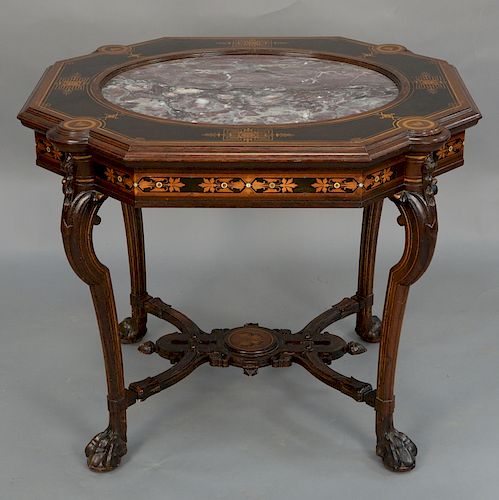 Renaissance Revival center table attributed to Herter Brothers, New York, 
purple inset marble surrounded by geometric inlays with t...