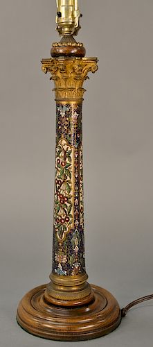 Corinthian column lamp, 
having bronze capital enameled champleve shaft on bronze and wood plinth. 
height 28 1/4 inches

Provenance...