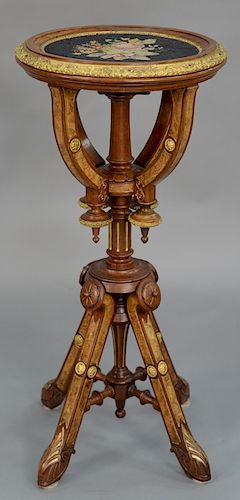 Renaissance Revival stand with needle point center, 
wood and gilt bronze surround on walnut and burl walnut base with gilt bronze m...