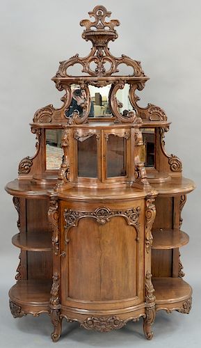 Rosewood etagere in two parts, attributed to Beme and Kimbal, 
upper portion with pierced carved and mirror back shelves on base wit...