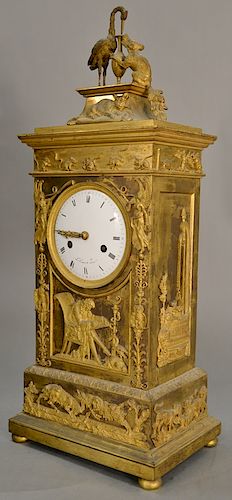 Gilt bronze mantel clock, ormolu mounted with stork and wolf over a cat over a band of mice, roosters, turtle, and rabbit, 
with win...