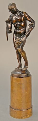 Figural statue of a nude man holding a bouquet of flowers and a bird standing on round base, marked on back of base: DaLou. 
bronze ...