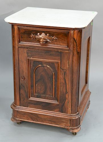 Rosewood Victorian half commode with shaped marble top. 
height 31 3/4 inches, width 22 inches, depth 18 1/2 inches