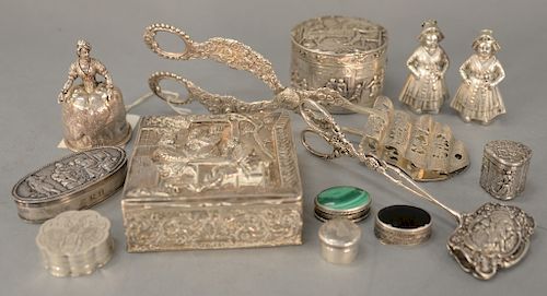 Thirteen piece lot to include two silver servers, large with repousse handles and 1981 Christie's East tag, silver figural bell with...