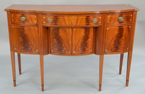 Fineberg Federal style mahogany sideboard with shaped top, 
over conforming case of three drawers over four doors, all set on square...