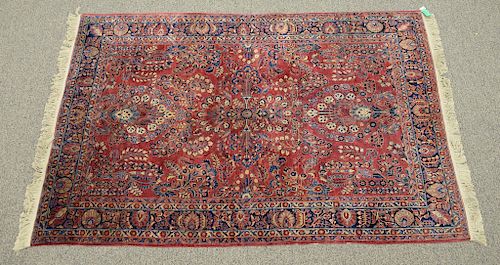 Sarouk Oriental carpet (refringed). 
6'9" x 10'