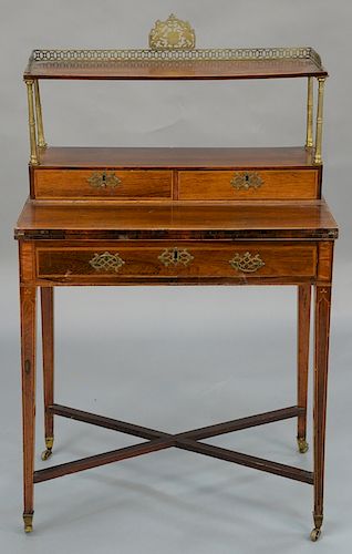 George III rosewood desk, 
with flip lid writing surface, tooled leather top and secret drawer. 
height 42 inches, width 29 inches