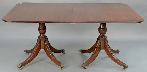 Custom mahogany two part dining table with double pedestal base and two 17 inch leaves.  height 29 1/2 inches, top closed: 47" x 6...