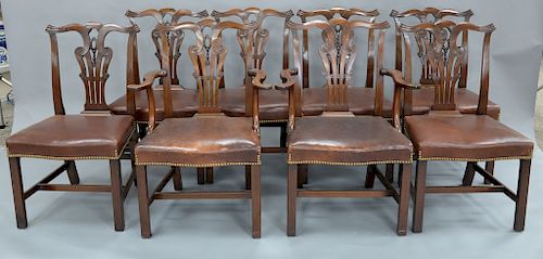 Set of eight Chippendale style, custom mahogany dining chairs, 
pierced carved backs and leather upholstered seats, set on squared l...