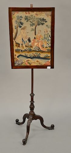 George III mahogany pole screen with needlework and petit point panel on carved tripod base. 
height 23 1/4 inches, width 17 inches