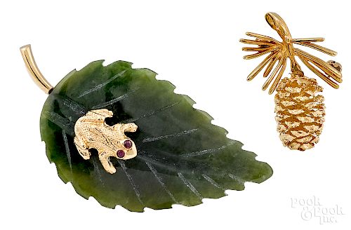 Two figural brooches