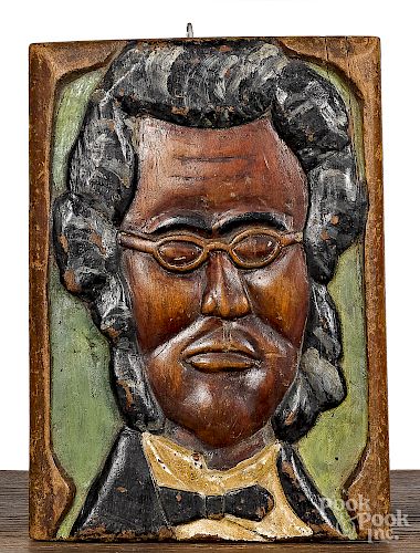 Carved and painted plaque