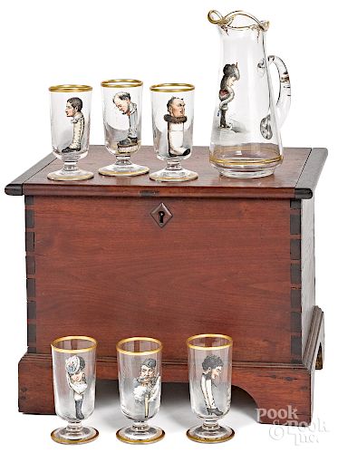 Walnut cellarette with a pitcher and six glasses