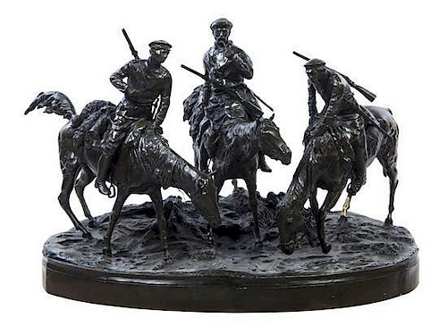 A Russian Bronze Figural Group, after Evgeni Alexandrovich Lanceray (1848-1886), Width 40 inches.