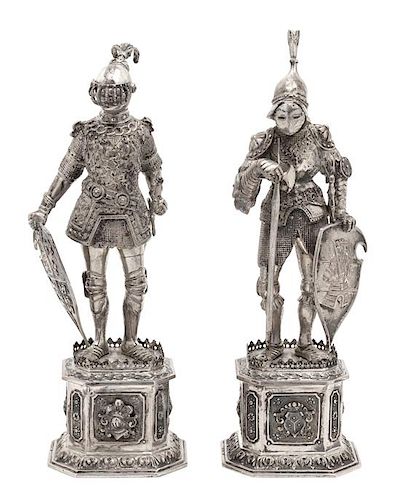 A Pair of German Hanau Silver Knights, 19TH CENTURY, depicting knights in full armor standing on pedestal bases.