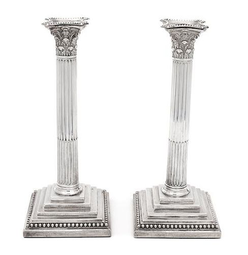 A Pair of English Weighted Silver Columnar Candlesticks, William Hutton & Sons, London, 1890,