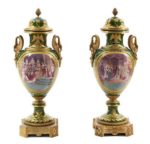 A Pair of Monumental Gilt Bronze Mounted Sevres Style Porcelain Napoleonic Urns Height 41 1/2 inches.