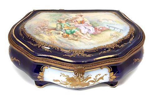 A Sevres Polychrome and Gilt Decorated Porcelain Jewel Box Height 5 x width 11 1/2 x depth 8 1/2 inches.