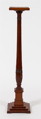 A Regency Style Mahogany Pedestal Height 50 1/2 x diameter squared 10 inches.