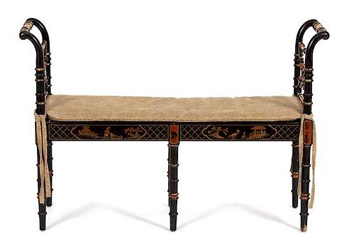 A Regency Style Painted and Parcel Gilt Rush Seat Window Bench Height 29 1/2 x width 43 x depth 13 inches.
