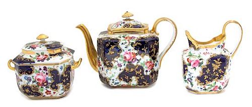 A Victorian Three-Piece Porcelain Tea Service Height of largest 6 1/2 inches.