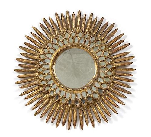 A Moroccan Giltwood Mirror Diameter 29 inches.