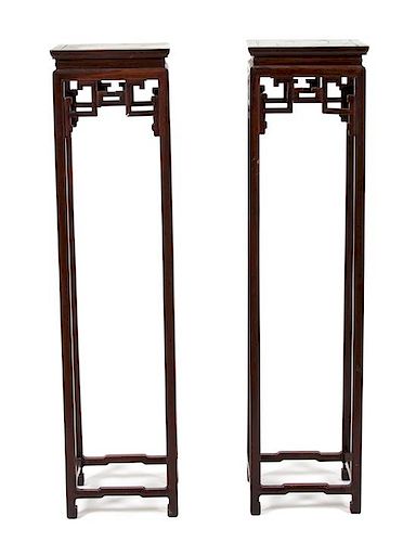 A Pair of Chinese Hardwood Stands Height 53 x width 13 x depth 13 inches.