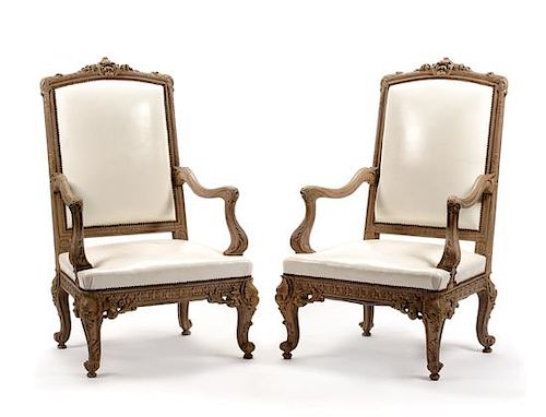 A Pair of Regence Style Carved Fauteuils Height 48 1/2 inches.