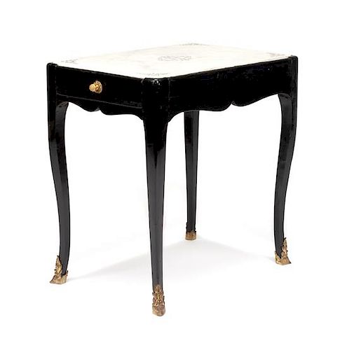 A Louis XV Ebonized Table Height 24 x width 15 3/4 x depth 23 1/2 inches.