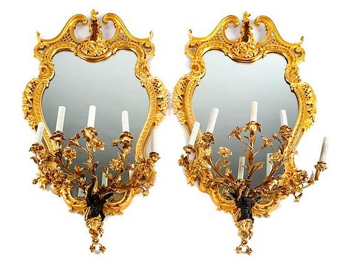 A Pair of Louis XV Style Gilt Bronze Five-Light Girandole Mirrors Height 39 1/4 x width 24 1/2 inches.
