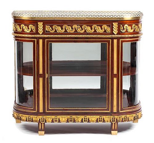 A Louis XVI Style Gilt Bronze Mounted Vitrine Height 44 x width 49 3/8 x depth 20 1/2 inches.