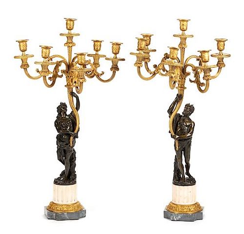 A Pair of Louis XVI Style Gilt and Patinated Bronze Six-Light Figural Candelabra Height 33 3/4 inches.