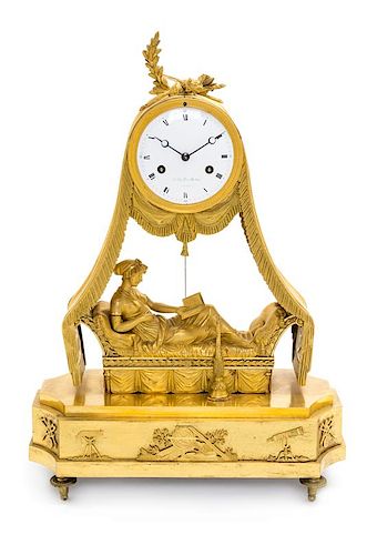 * A Directoire Gilt Bronze Mantel Clock