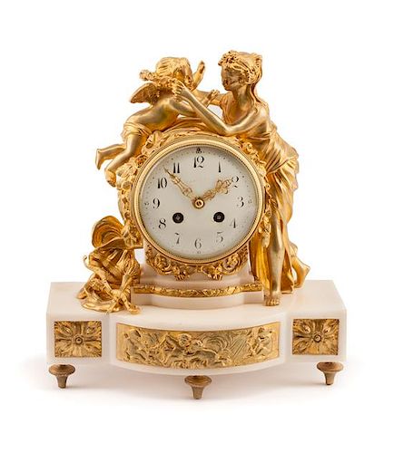 A French Gilt Bronze Mounted Marble Figural Mantel Clock Height 12 x width 11 x depth 5 1/2 inches.