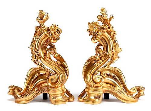 A Pair of Napoleon III Style Gilt Bronze Chenets Height 25 x width 18 1/2 inches.