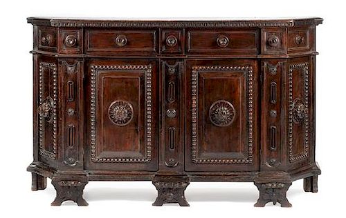 An Italian Renaissance Revival Sideboard Height 47 1/2 x width 78 1/2 x depth 23 inches.
