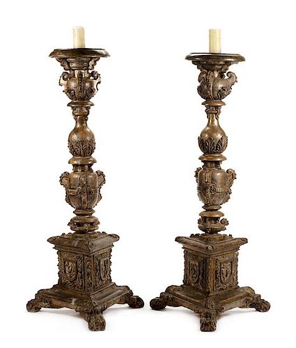 A Pair of Italian Giltwood Torcheres Height 65 1/2 inches.