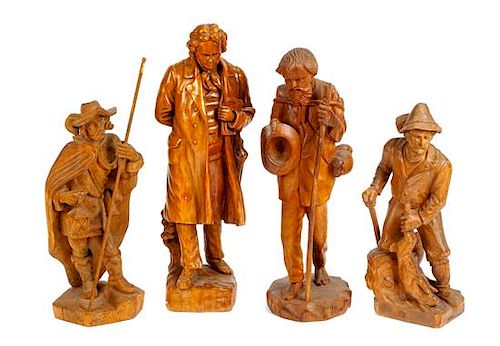 Four Continental Carved Wood Figures Height of tallest 26 inches.