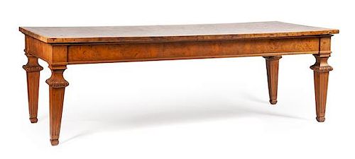 An Italian Neoclassical Burlwood Dining Table Height 31 1/2 x length 99 x depth 39 1/2 inches.