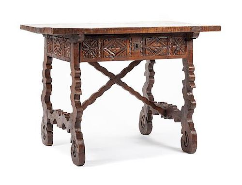 A Spanish Baroque Walnut Work Table Height 32 x width 43 x depth 28 1/2 inches.