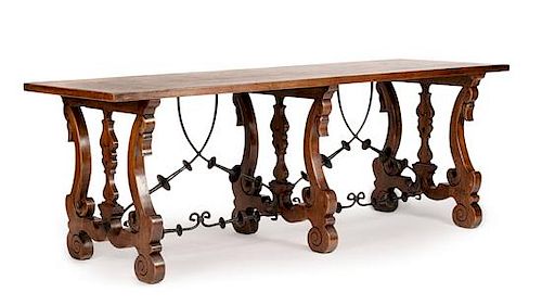 A Spanish Renaissance Revival Iron Mounted Trestle Table Height 32 x width 86 1/4 x depth 31 1/2 inches.