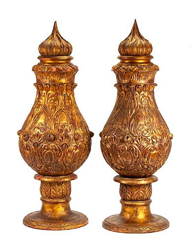A Pair of Large Gilt Decorated Carved Wood Urns Height 62 inches.