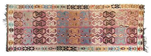 A Turkish Kilim Wool Rug 13 feet 3 inches x 4 feet 7 inches.