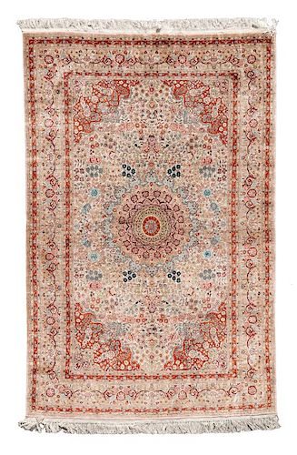 An Isfahan Silk Rug 6 feet 1 inch x 4 feet 1 inch.