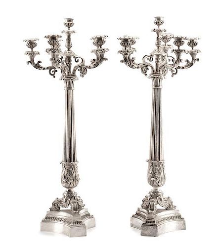 A Pair of French Silvered Bronze Six-Light Candelabra, 19th Century, each tapering stem of columnar form with acanthus leaves, r