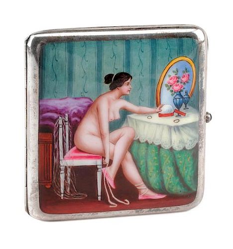 An Enameled Silver Cigarette Case, Late 19th/Early 20th Century, the lid enameled to show a seated nude before a dressing table.