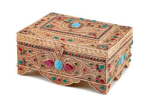 A Silver Filigree and Semi-Precious Stone-Inset Box, 20th Century, of rectangular form with stylized floral decoration.